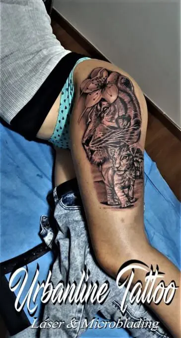 Tatuaje realista pierna tigre, trabajo de Urbanline Tattoo