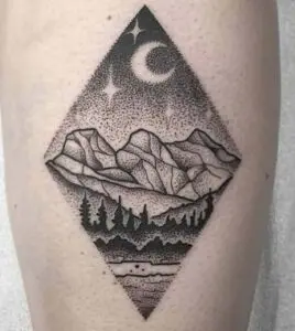 Tatuaje paisaje tipo puntillismo