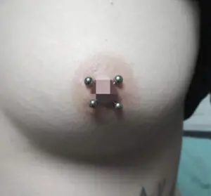Doble Piercing en el pezón