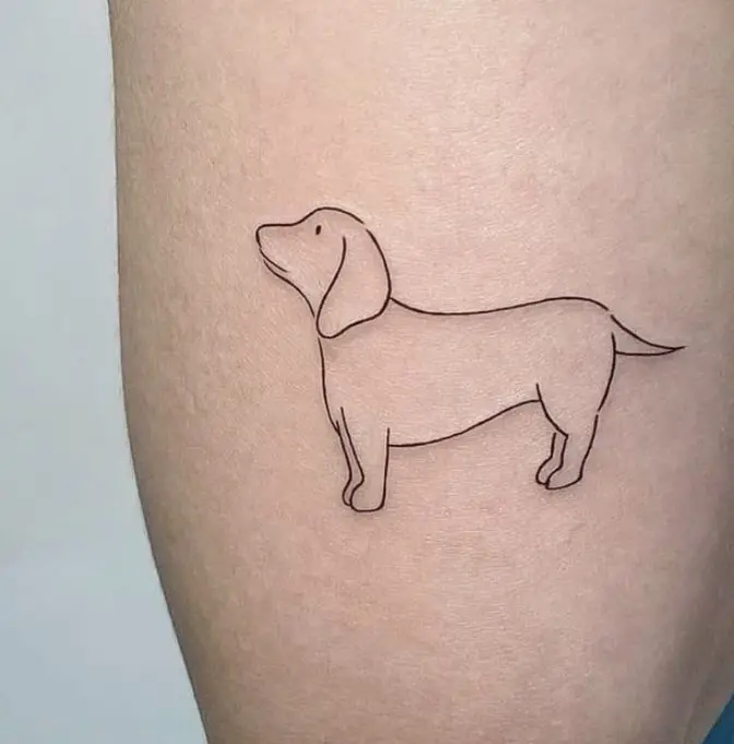 Tatuaje perro en línea fina